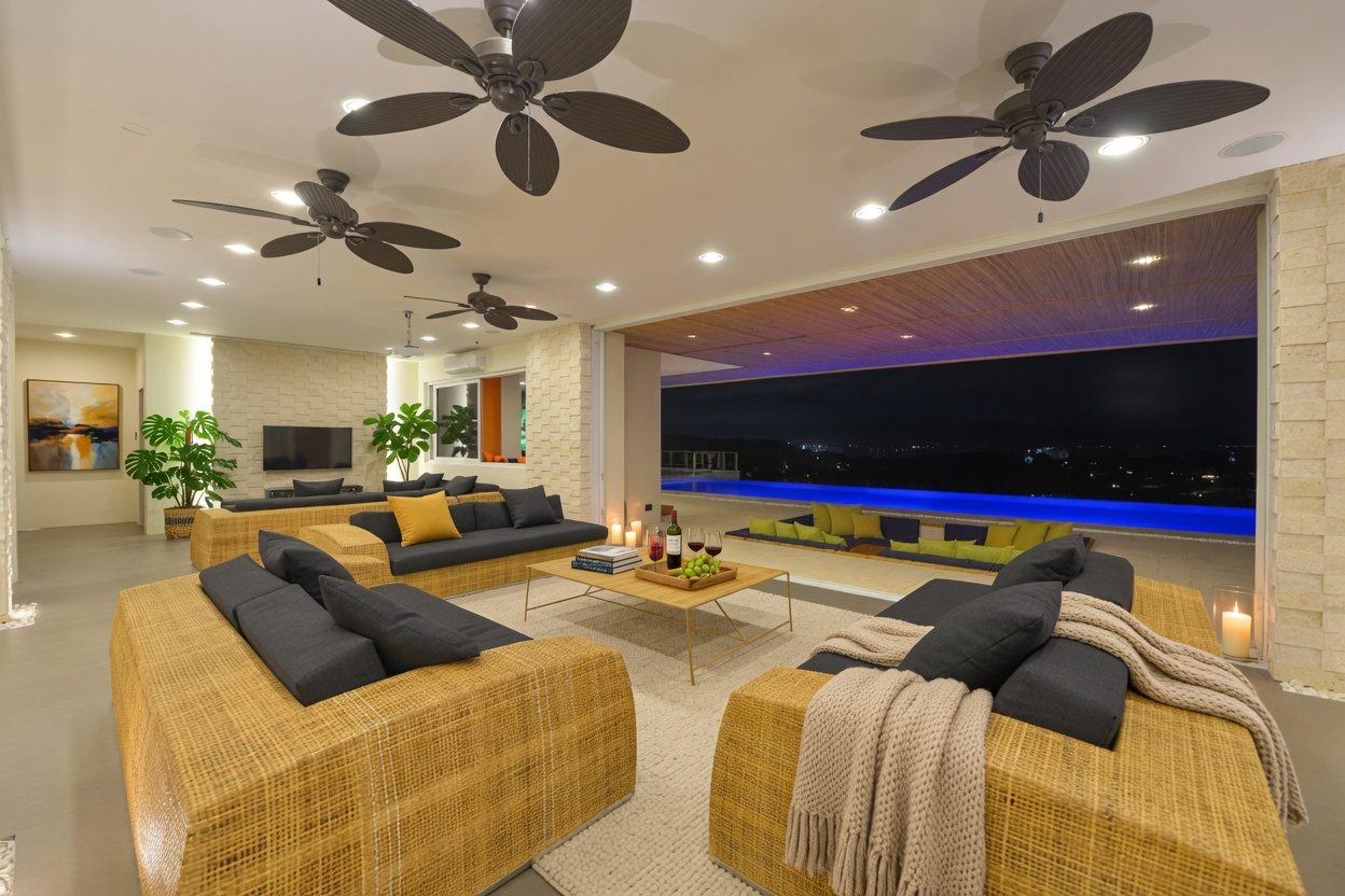 Living room at Caipirinha Villa opening onto the pool